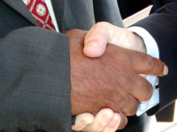 image of two people shaking hands